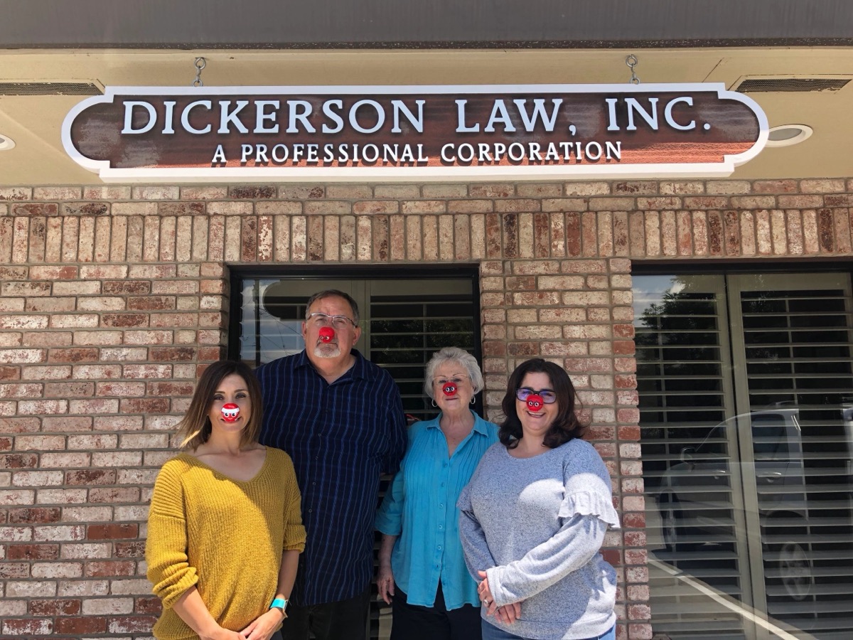 The Dickerson Law team together at a Red Nose community event